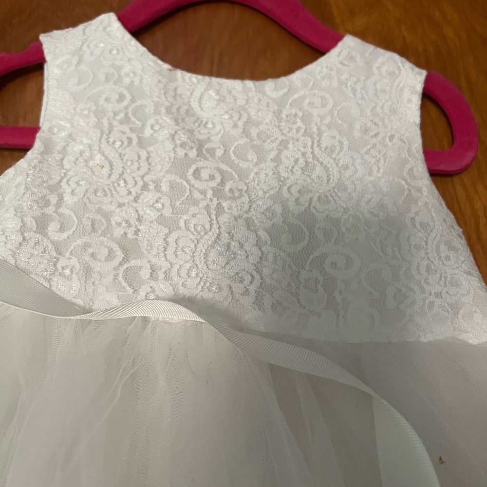 White ball gown flower girl dress with heart cutout